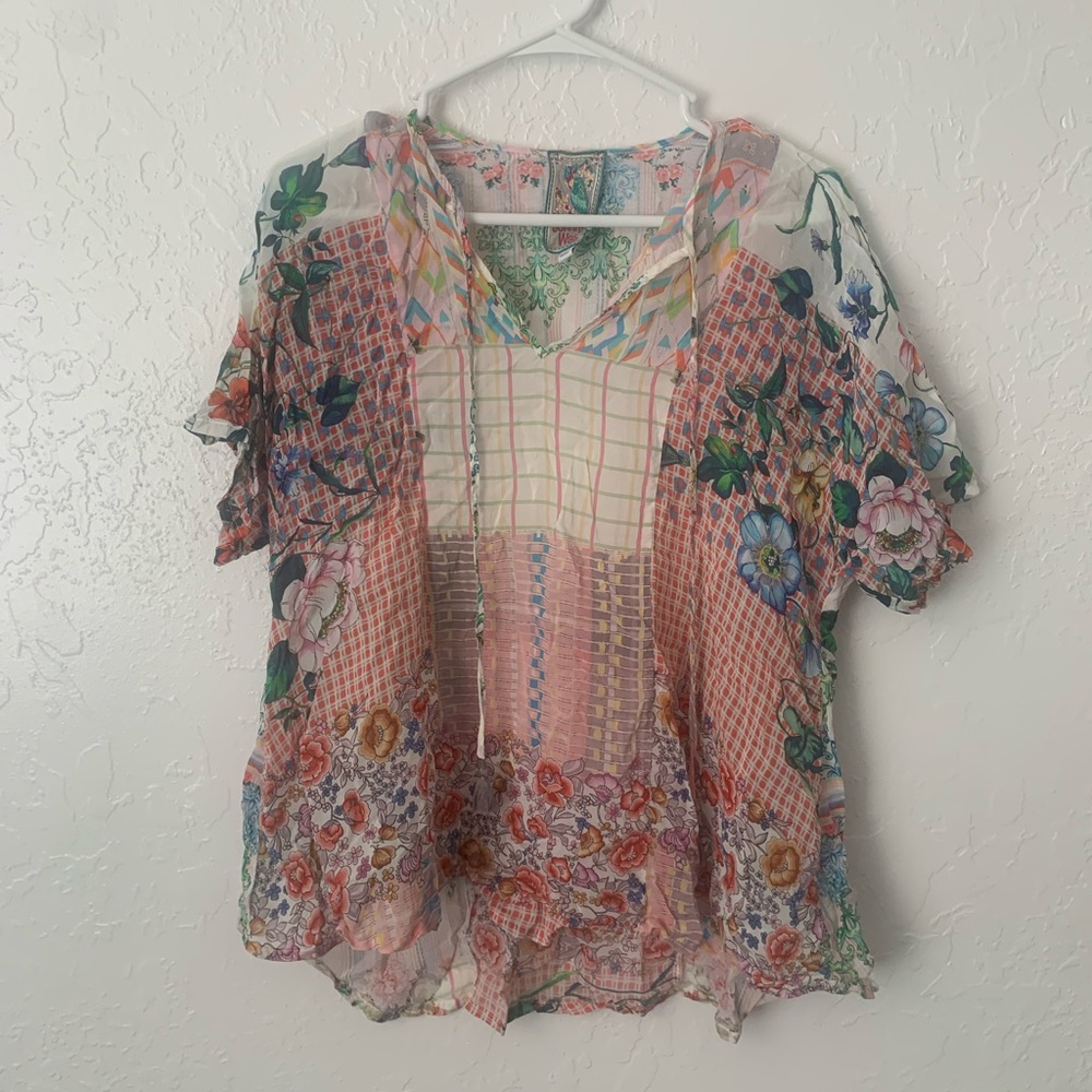 Johnny was shirt size small